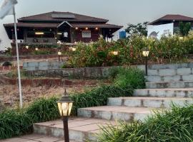 Fulora Guesthouse, hotel u gradu 'Dapoli'