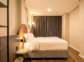 Xtay Cais Rooftop - Hospede-se a poucos passos do South Summit Brazil