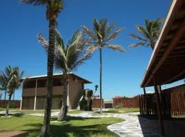 Beach front One Bedroom with Pool and Garden Views