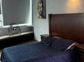 Cuarto a unos pasos de foro sol GNP y AICM, hotell i Mexico City