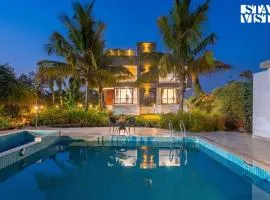 StayVista at The Green Courtyard with Pool and BBQ