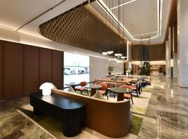 Hilton Garden Inn Zhoukou Chuanhui, hôtel à Zhoukou