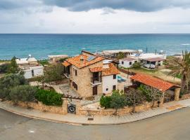 Petrochtisto Coastal Escape with Pool and Sea Views, hótel í Pomos