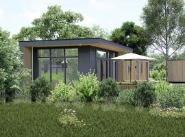 Lodge Huis ter Huynen - De Heide met Hottub, hotel di Zeijen