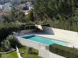 Apartment with pool and garage 100m from the sea in Villa Calista