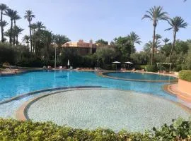 Chic Palm Grove Apartment Pool View