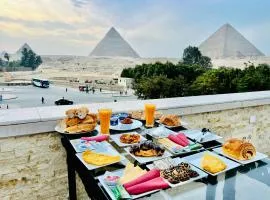 Alivia Scarab Pyramids View