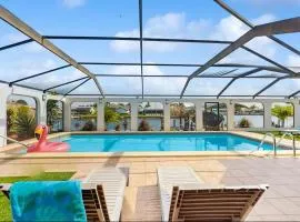 Riverfront Escape with Pool, Tiki Hut & Gulf Access Fun - Villa Kai Malie - Roelens