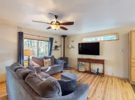 Two-story home with sunroom, large yard, fire pit, & BBQ grill