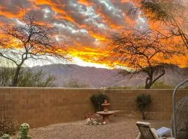 Dog-friendly desert home with mountain views, enclosed yard, grill, WD, and AC