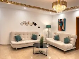 Charming 2-Bedroom Apartment with Garden View Balcony
