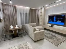 Two-bedroom hotel apartment and a hall close to the campus and services