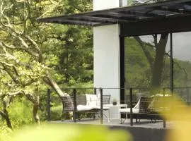 Loft hermoso entre el bosque, vista al Lago.