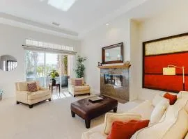 Pristine home with a wet bar, outdoor kitchen, private pool, & spa