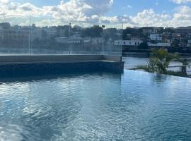 Apartamento con Vista a la Marina San Soucí y Balcón con Vista a la Zona Colonial, hotel a Calero
