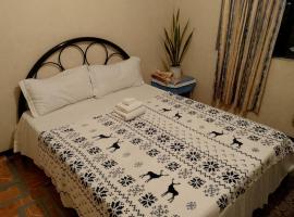 Cristine's Guesthouse, hotell sihtkohas Uldugan