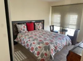 Chambre privative design avec espace salon & cuisine 15 min de Paris