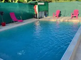 Maison charmante à Petit-Bourg avec piscine partagée