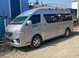 15 seater Luxary Hiace Vehicle, Hotel in Butwāl