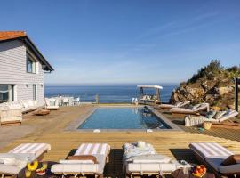 Wishome-Casa espectacular sobre acantilado con piscina privada, a 5 minutos de la playa - Disfruta de un verano más fresco, hotel en Pechón