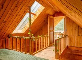 Riverside Mudhouse Duplex Cottage by Kahani