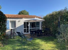 Maison DOLUS 4pers dans Résidence Privée avec Piscine et SPA, hotel din Dolus d'Oléron