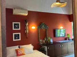 Quarto em casa de praia com estacionamento