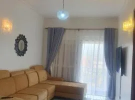 Two Bedrooms Apartment, located between kajjansi and kitende, with one bathroom, a living room, fully furnished kitchen, patio, free wifi, free parking space
