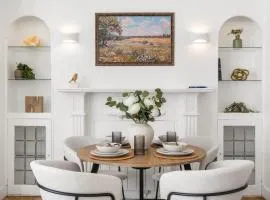 Elegant Coastal Apartment Walk to Beach & Town