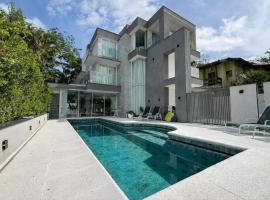 Maravilhosa casa de temporada 5min da praia, hotel a Itajaí