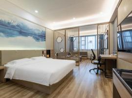 VX Hotel Jiangsu Taizhou Xinghua RT-Mart, hotel di Xinghua