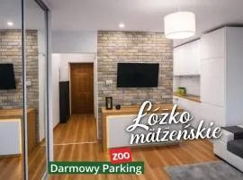 ŚLICZNY APARTAMENT obok MANUFAKTURY w pełni wyposażony-na wyłaczność PARTER-blok-DARMOWY PARKING-blisko Orientarium-ZOO- AQUAPARK FALA-CISZA-WYGODA-SPOKÓJ-Wifi-Samodzielne-ZAMELDOWANIE-Spokojna okolica Świetna lokalizacja
