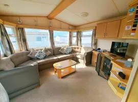 Plum 1 a luxury 3 bed 8 berth static caravan, bedding included, close proximity to popular Sealands family club on Coral Beach in Ingoldmells