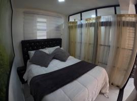 Condo moderne en plein coeur de Sosua 2 lits, 212, hotel din Sosúa