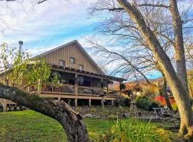 Water's Edge, Covered Porch, Deep Creek as your Backyard Haven, Hot Tub, Pool Table, Fire Pit, Close to Town & Entrance to National Park