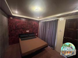 Witty Woods Guesthouse, hotel a Camalig
