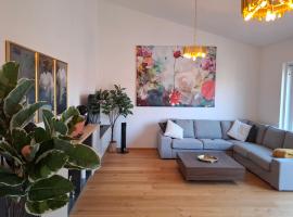 Penthouse mit Seeblick & Terrasse Top 8, Hotel in Reifnitz