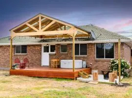 Hobart Family Retreat with Spa and Backyard Near Airport