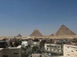 Youssef pyramids view