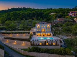 Villa Esarjo with Heated Pool and Sea View, Hotel in Veprinac