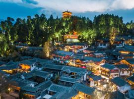 The Naxi Hereditary Courtyard - Chinese Nature's Design Retreat, hótel í Lijiang