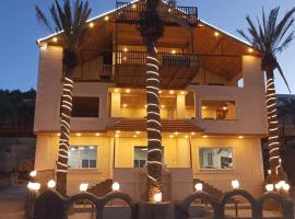 الشريف, hotel a Riḩābā