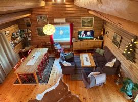 Nice log house close to Lillehammer and Sjusjøen, Hotel in Haugen