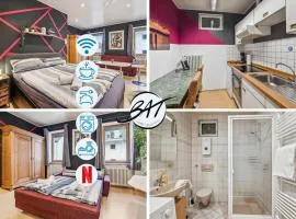 BAT Home Solutions Trier-Euren - alles was ein Hotel nicht bietet - 35 qm Ferienwohnung, Heimkino, Wallbox, Küche für 4 Personen