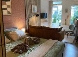 Appartement met jacuzzi in Huizen, Hotel in Huizen