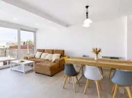 Villa en la playa con vistas al mar y jardín