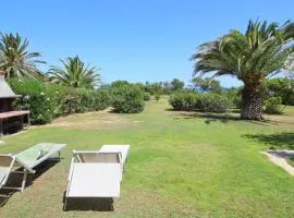 Costa Rei Villa in Prima Fila Mare con Ampio Giardino