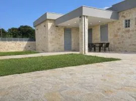 AG Stone Home - Idyllic Beachside Villa in Isthmia