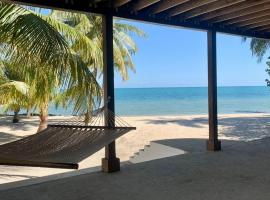 Beachfront Home Kissin' the Caribbean, Hotel in Placencia Village