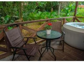 Cabin in the woods with jacuzzi, terrace and campfire